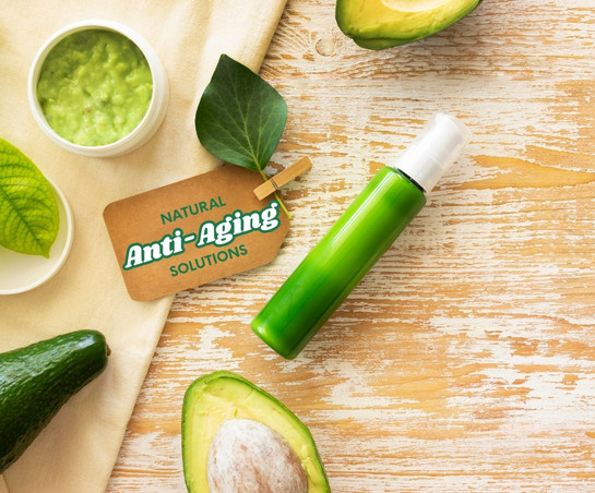 Fresh avocado and green serum bottle highlight natural ingredients used in anti-aging skincare solutions.