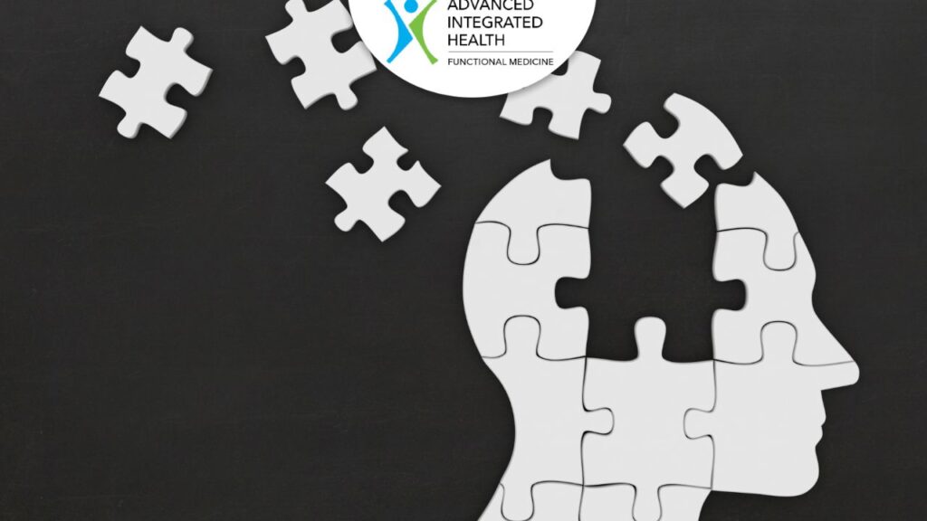 Puzzle head illustration representing holistic brain health support at Advanced Integrated Health