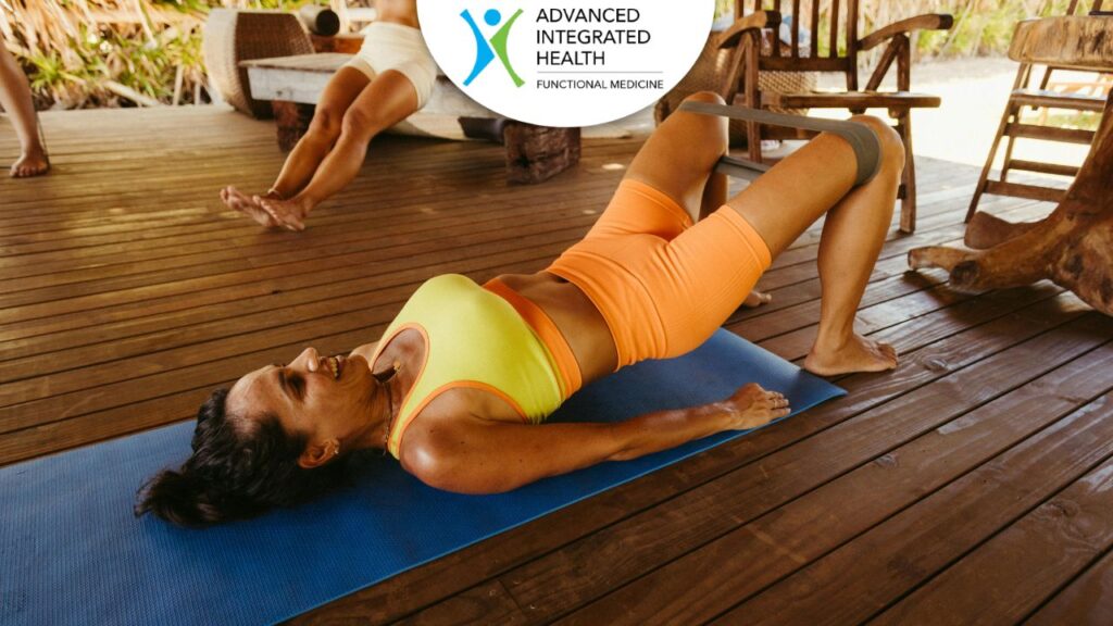 Woman doing yoga bridge pose to support holistic brain health at Advanced Integrated Health